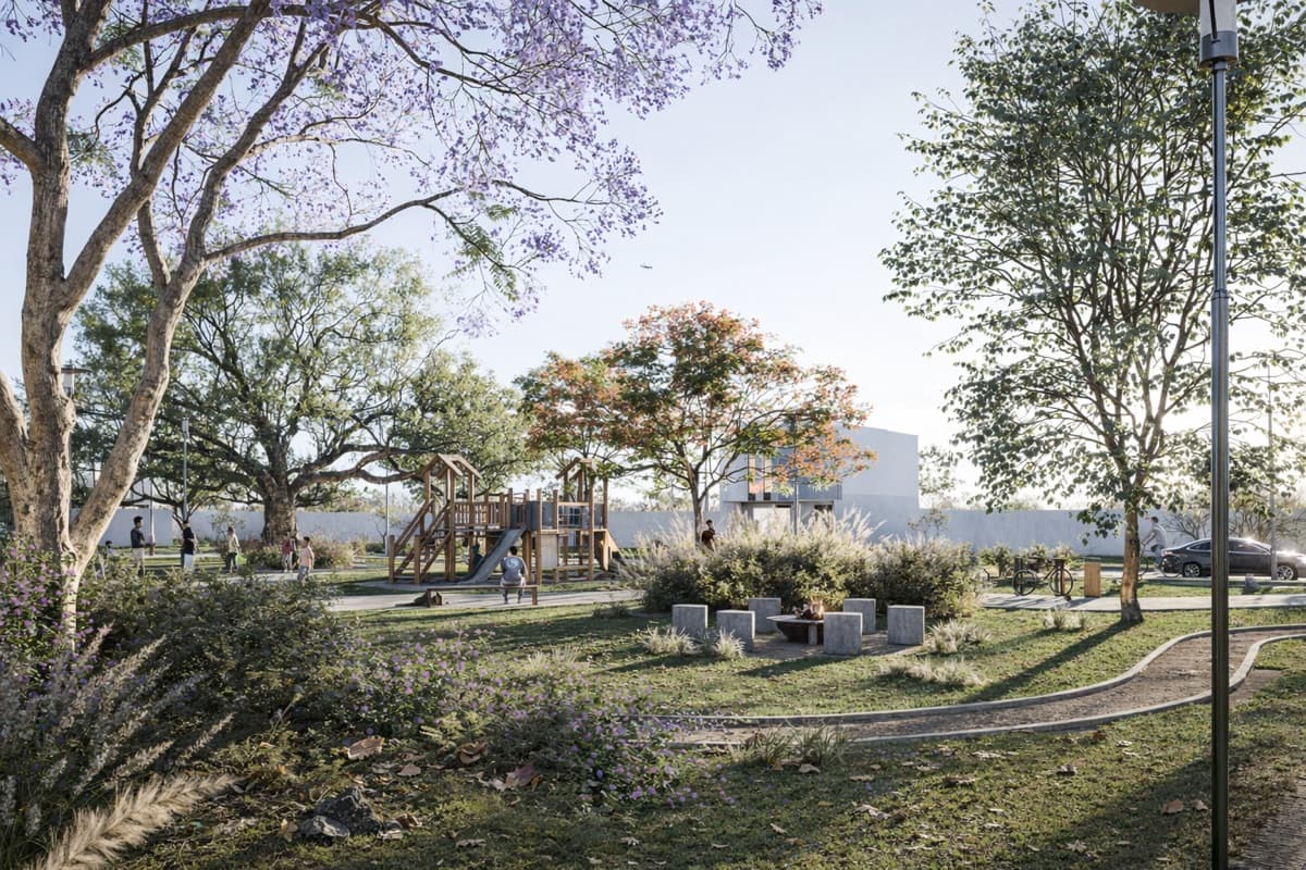 Fogatero con bancas de concreto, jacarandas y pista para correr en VERA Residencial